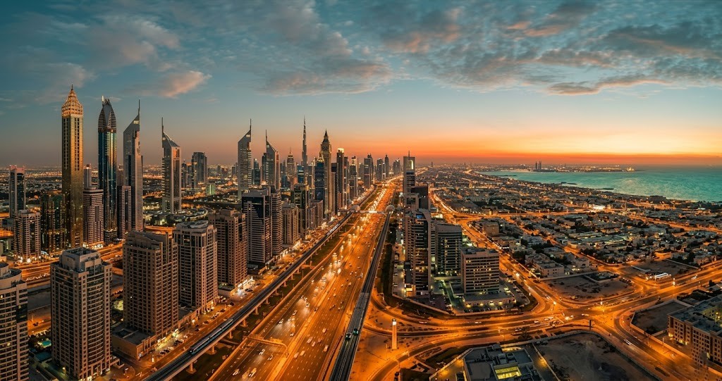 Dubai skyline aerial view — Sheikh Zayed Road residential and commercial property towers representing the Dubai real estate market